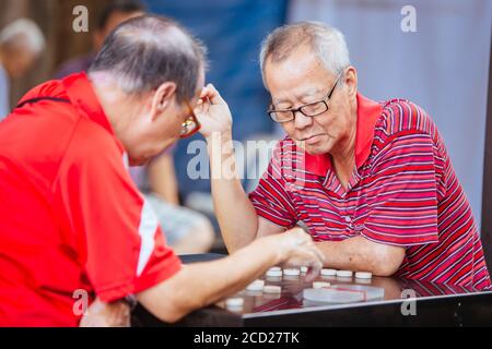 Xiangqi suonato a Singapore Foto Stock