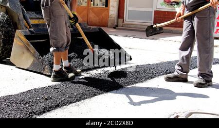 Riparazione della superficie stradale o stradale, immagine di un Foto Stock