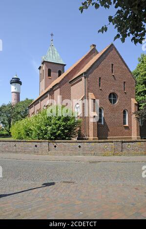 Antico faro e chiesa su Wangerooge Foto Stock