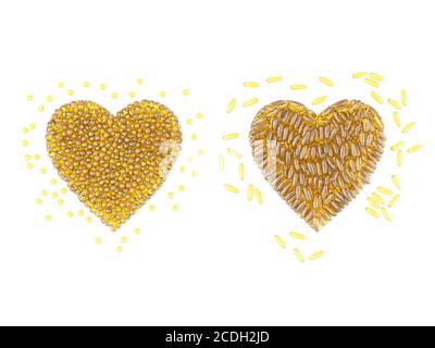 Due cuori di capsule rotonde e dorate oblunghe. Rendering 3D Foto Stock