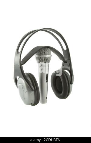 In aria!!! Microfono DJ cuffie wireless su esso isolate su sfondo bianco Foto Stock