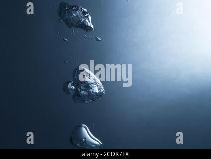 grandi bolle d'aria in acqua elegante sfondo blu Foto Stock