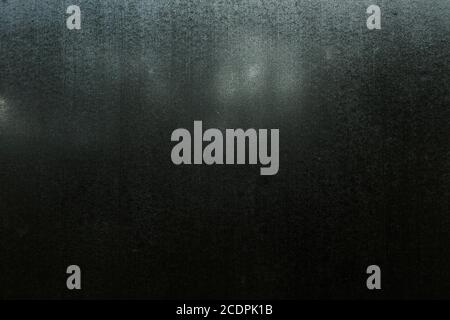 Contensazione dell'acqua su un vetro della finestra Foto Stock