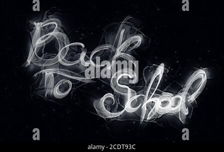 Torna a scuola parole scritte fatte da fuoco bianco o. fiamma su sfondo nero a riflessione di ghiaccio Foto Stock