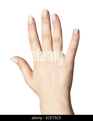 Mano femminile con manicure professionale naturale per unghie di pezza su bianco Foto Stock