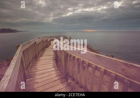 Passerella sulla costa neozelandese Foto Stock