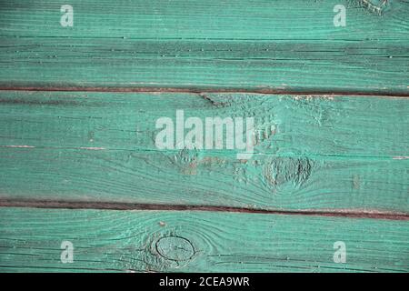 vecchi pannelli di legno grunge verniciati in verde teal usati come sfondo Foto Stock