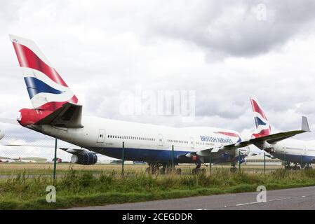 Decommissionato, British Airways, Boeing 747, aereo dietro recinzione, ritiro dell'iconico Boeing 747 jumbo jet Foto Stock