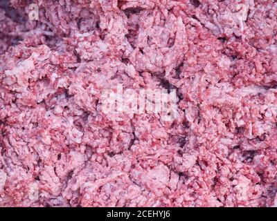 Closeup cumulo di macinato fresco e misto di carne cruda Foto Stock
