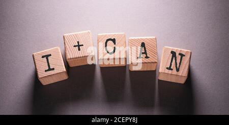 Posso parola scritta su cubi di legno Foto Stock
