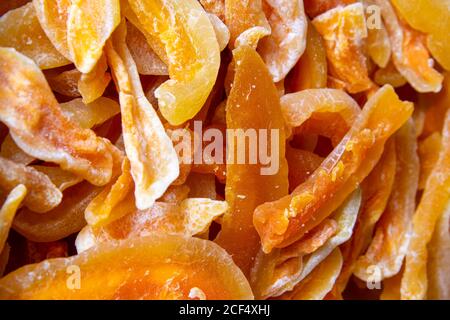 Consistenza di fette di melone candite essiccate. Viste dall'alto, primo piano Foto Stock