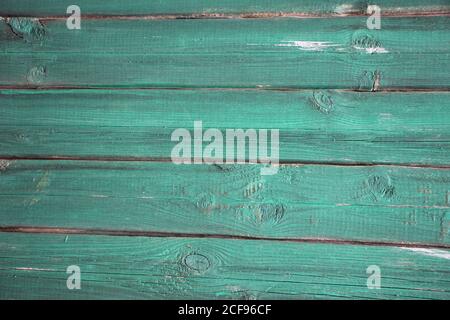 vecchi pannelli di legno grunge verniciati in verde teal usati come sfondo Foto Stock