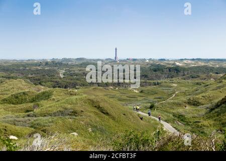 Dune panoramiche nel mezzo dell'isola, faro, Norderney, Isole Frisone Orientali Foto Stock