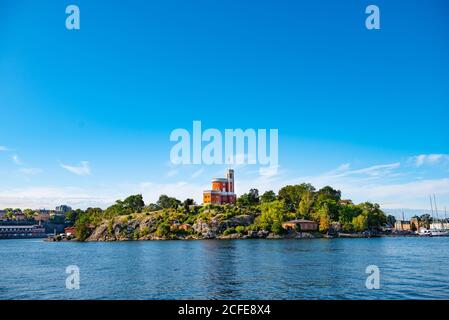 Bella vista dal Mar Baltico sulla Cittadella Kastellet sull'isolotto Kastellholmen nel centro di Stoccolma, Svezia. Foto Stock