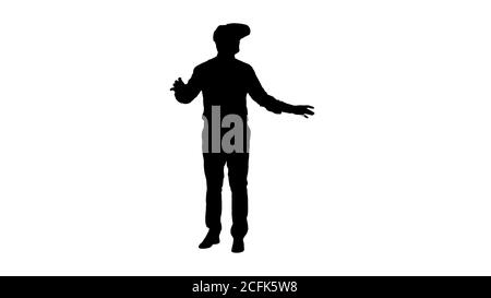 Silhouette sorprendente giovane uomo d'affari che indossa occhiali VR. Concetto di tecnologia futura. Foto Stock