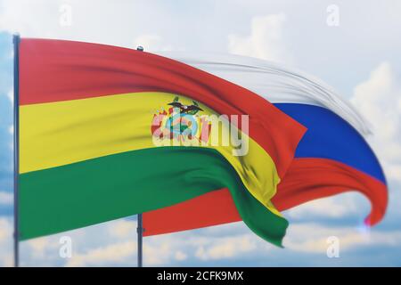 Sventolare bandiera russa e bandiera della Bolivia. Vista in primo piano, illustrazione 3D. Foto Stock