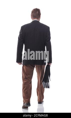 vista laterale. uomo d'affari riuscito con una valigetta di pelle che si fa avanti Foto Stock