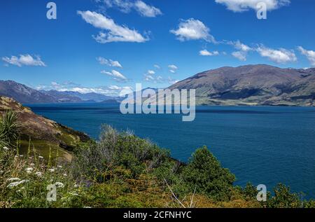 Lago Wanaka e le montagne, Otago, Isola del Sud, Nuova Zelanda, Oceania. Foto Stock