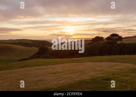 Sunset Over, Hope Cove, Kingsbridge, Devon, Inghilterra, Regno Unito. Foto Stock