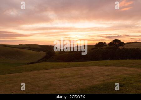 Sunset Over, Hope Cove, Kingsbridge, Devon, Inghilterra, Regno Unito. Foto Stock