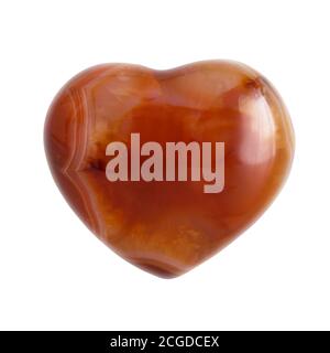 Semireciosa pietra carnelia spirituale a forma di cuore isolata su bianco Foto Stock