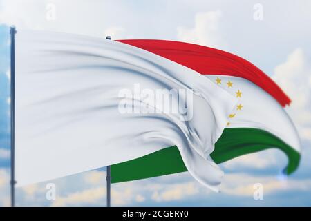 Bandiera bianca sul flagpole che sventola nel vento e bandiera del Tagikistan. Vista in primo piano, illustrazione 3D. Foto Stock