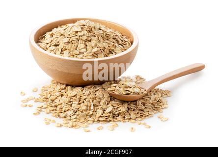 Farinata d'avena in una ciotola di legno su sfondo bianco e un cucchiaio di legno Foto Stock