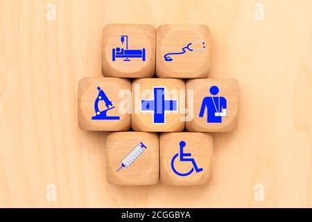 Cure mediche come simbolo su cubi di legno Foto Stock