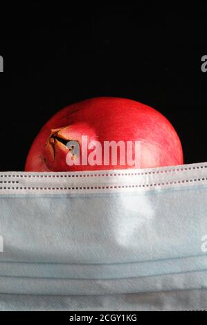 Corona Rosh hashana - concetto - maschera con melograno Foto Stock