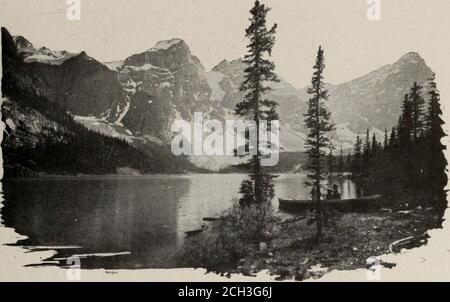 . Attraverso il Canada : guida annotata via il Pacifico canadese, il sistema di trasporto più grande del mondo: Linee occidentali dirette ad est. Lago Louise 39. Moraine Lago e Valle dei dieci picchi El don 4822 lasciando il Lago Louise abbiamo mag-Castello montagna 4633 viste magnifiche del panorama circostante delle montagne. Di fronte al Wesee Pilot Mountain, al Copper Mountain, al Mount Brett e al Ver-Milion Pass, dove lo spartiacque continentale, invia il VermilionRiver verso ovest fino al Kootenay. A sud si trova StormMountain (10309 piedi) e la cupola innevata del Mount Ball (10825 piedi). La più grande e grande di tutte le torri Foto Stock