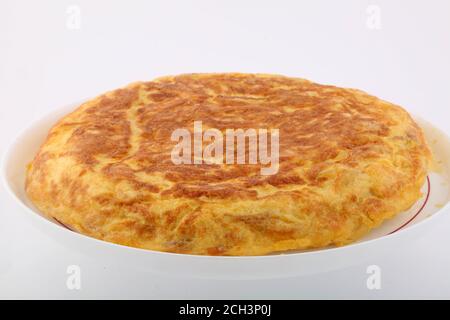 tipica frittata spagnola con uova, cipolle e patate Foto Stock