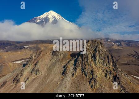 Verblyud rock e il vulcano Koryaksky Foto Stock