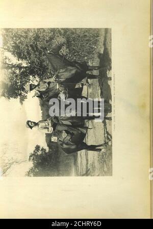 . Kentucky log . Thing andtoring stranamente in aria still, e uno sciocchito di uccelli rossi su tutti i lati salutato il giorno-luce con canzone ansiosa. Ci erano stati uccelli rossi che si erano inziditi qua e là attraverso thehills, ma nessun tale outburst come questo, che ha preso i miei pensieri vagando lontano in othertimes e luoghi. Un po' piacevole remin-iscence fa meraviglie per alleggerire il lavoro, e i cavalli sono stati presto curried e spazzolati andworking via alla loro colazione. Il nostro seguito, e da otto eravamo fuori. Circa due miglia sotto Evans era WolfShoal, la velocità di cui il capitano era togauge. Mentre eravamo al lavoro una maggior parte e Foto Stock