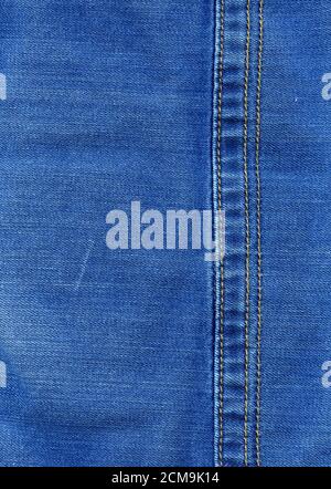 Cucito textured blue jeans tessuto denim sfondo Foto Stock