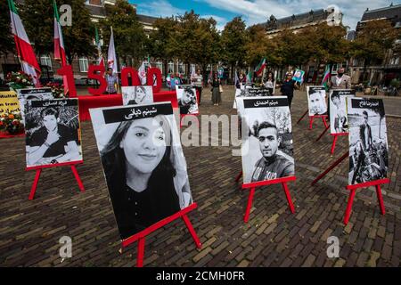 Plein, l'Aia, Paesi Bassi. Mercoledì 16 settembre, 2020. La protesta di oggi sul Plein è stata solo una delle numerose manifestazioni che si sono svolte in tutto il mondo per salvare la vita dei prigionieri politici detenuti nella prigione di Evin in Iran. A giorni di manifestazione è stato quello di mettere in luce l'esecuzione di uno, la mattina di Sabato 12 settembre, 2020. Il lottatore campione olimpico di 27 anni, Navid Afkari, un prigioniero politico, è stato giustiziato all'inizio di quella mattina, nonostante una campagna globale che ha chiesto all'Iran di revocare la sua esecuzione. Credit: Charles M Vella/Alamy Live News Foto Stock