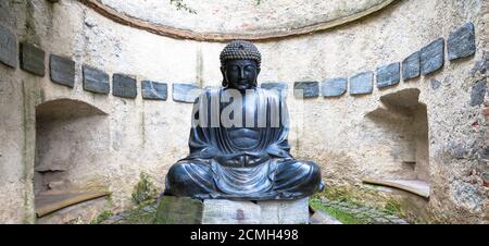 Meditando il giapponese statua del Buddha Foto Stock