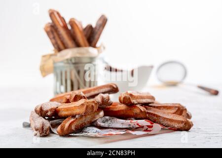 Tradizionale spagnolo churros dessert. Foto Stock