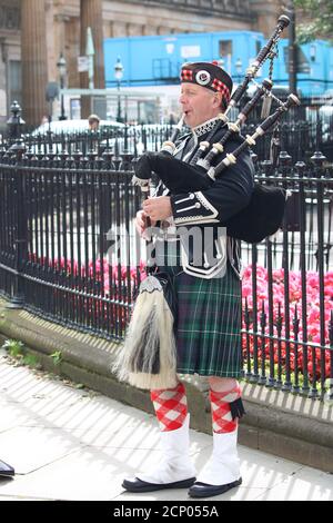 Bampes Player Busking a Edimburgo, Scozia Foto Stock