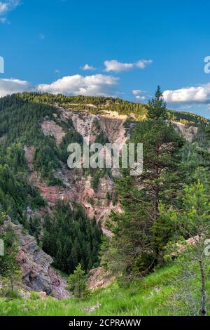 Aldein, Provincia di Bolzano, Alto Adige, Italia. Geoparc Bletterbach. Vista del "Butterloch" nella gola di Bletterbach Foto Stock