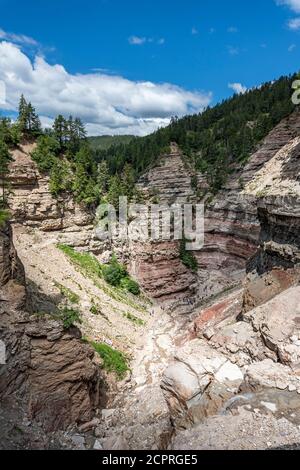 Aldein, Provincia di Bolzano, Alto Adige, Italia. Geoparc Bletterbach. Il cosiddetto "Butter Hole" nella gola di Bletterbach Foto Stock