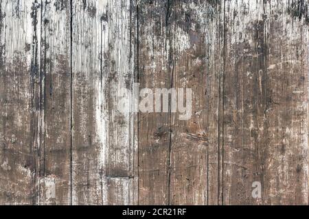 Sfondo di legno intemperie. Vecchi plankscon vernice di peeling. Sfondo di vecchio frammento di legno dipinto. Foto Stock