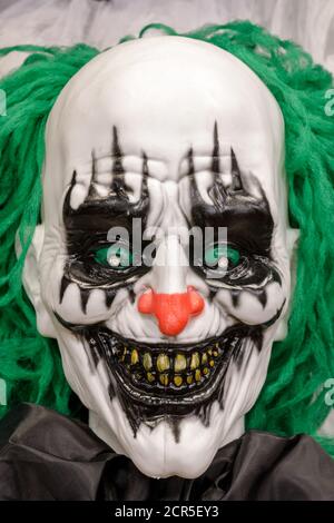 Faccia Creepy Clown illuminata Foto Stock