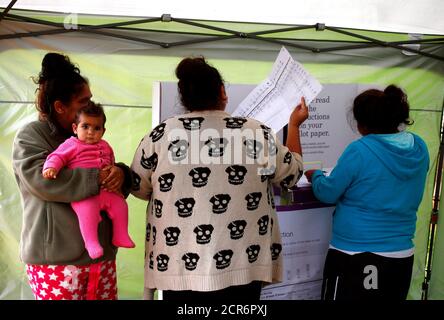 Aboriginal women vote in a remote voting station in the western New South Wales outback town of Enngonia, Australia, June 22, 2016.    REUTERS/David Gray SEARCH 'VOTE OUTBACK' FOR THIS STORY. SEARCH 'THE WIDER IMAGE' FOR ALL STORIES.