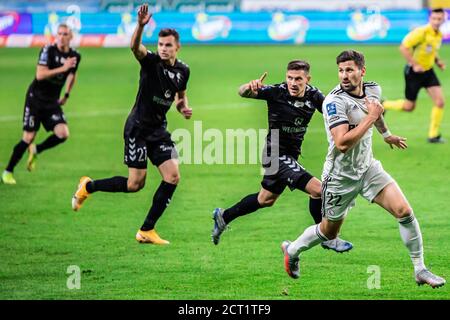 Adrian Gryszkiewicz, Erik Janza di Gornik e Pawel Wszolek di Legia sono visti in azione durante la partita polacca della PKO Ekstraklasa League tra Legia Warszawa e Gornik Zabrze al Marshal Jozef Pilsudski Legia Warsaw Municipal Stadium. (Punteggio finale; Legia Warszawa 1:3 Gornik Zabrze) Foto Stock