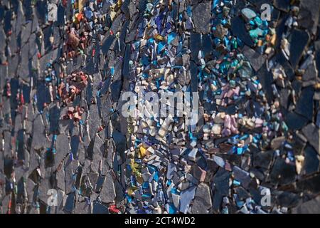Muro di pietra mosaico di colori Foto Stock