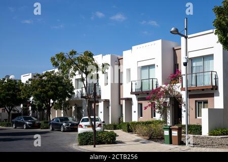 Case cittadine ad al Mouj, The Wave, Muscat, Sultanato di Oman. Foto Stock