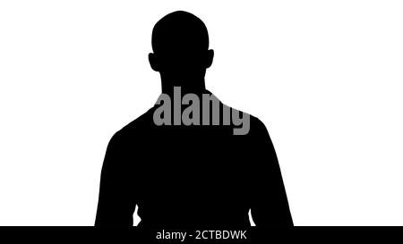 Silhouette attraente modello arabo che cammina. Foto Stock