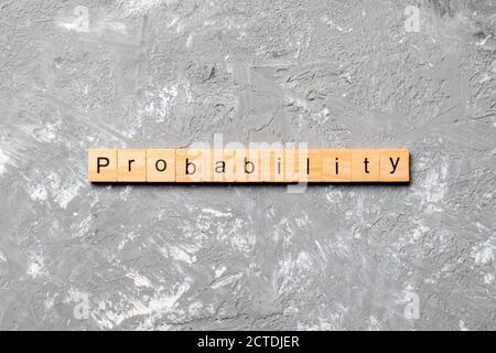 Probabilità parola scritta sul blocco di legno. probabilità del testo in tabella, concetto. Foto Stock