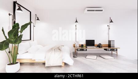 Camera da letto interna in stile loft con computer e utensili da ufficio sulla scrivania. Rendering 3D Foto Stock