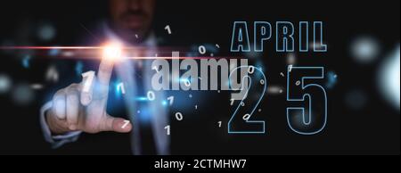 25 aprile. Giorno 25 del mese, pubblicità o calendario high-tech, l'uomo in abito preme pulsante virtuale brillante primavera mese, giorno dell'anno concetto. Foto Stock